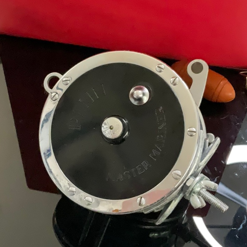 Black and Silver Fishing Reel